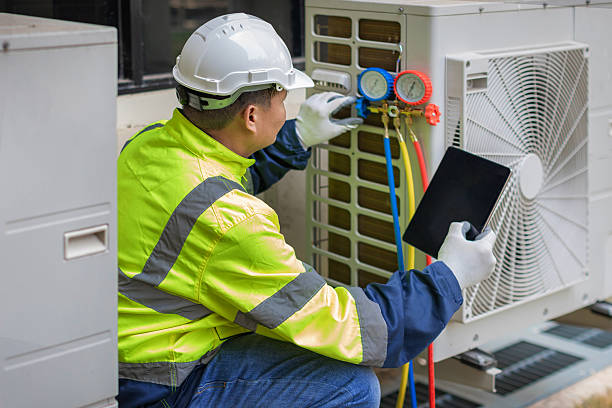 Professional Heat Pump Repair technician working in Oak Grove, MS